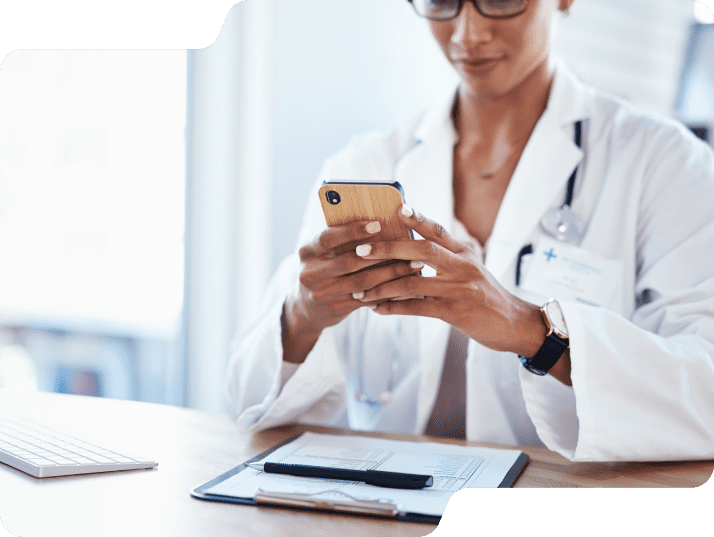 Clinician holding smartphone.