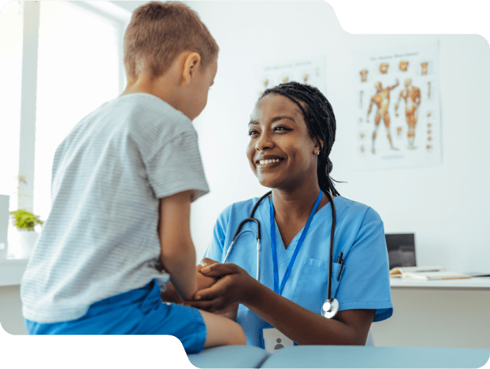Woman working at a clinic assessing a child.