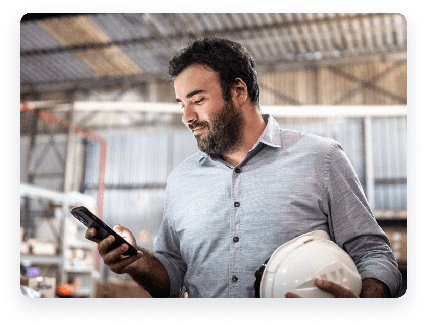 Man in warehouse on phone