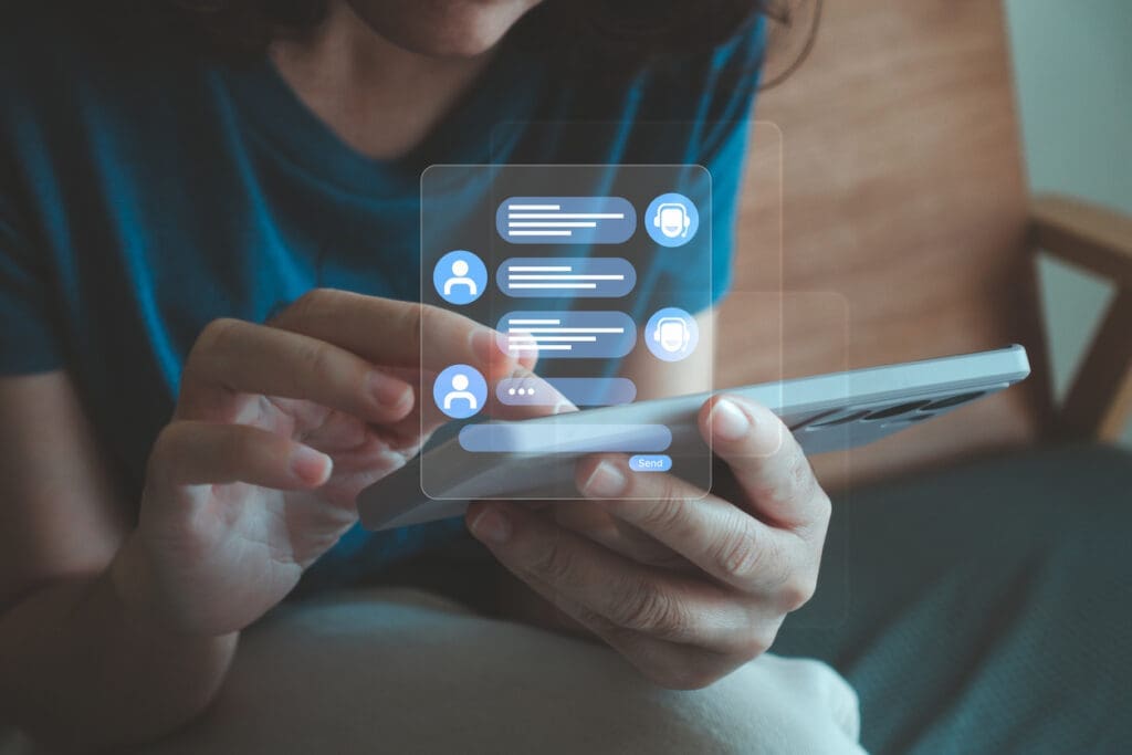 A user interacts with a virtual attendant system through automated mobile communication.