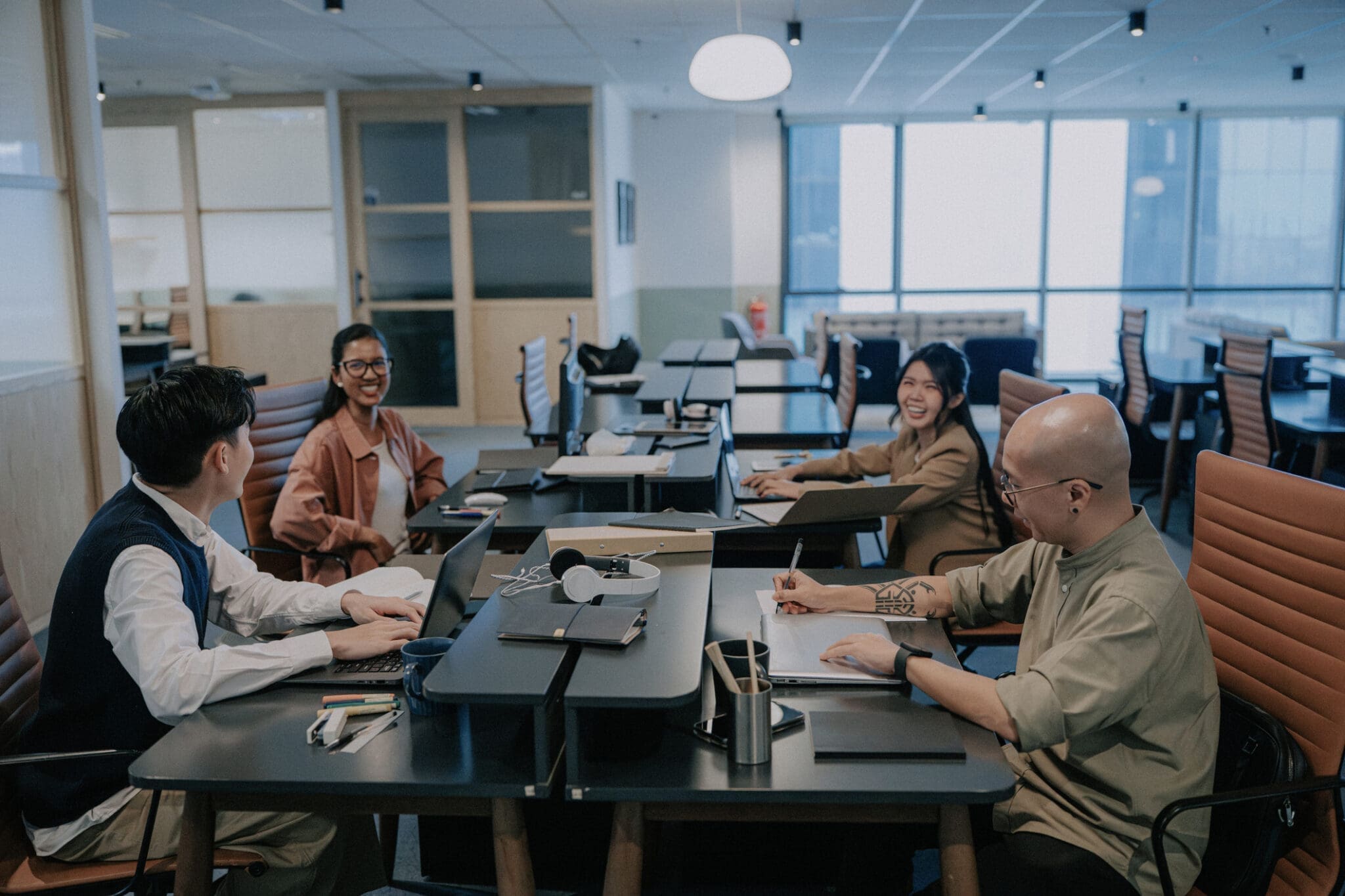 Business team in office using modern telecommunication tools for professional collaboration.
